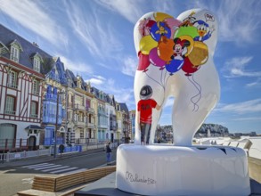 Mers-les-Bains, France - August 28, 2023 Large tooth art, Forever smile by Florence Muliardo,