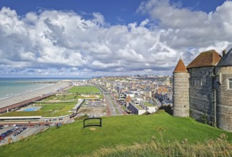 An elevated view captures Dieppe and its coastline. The historic stone castle with pointed towers