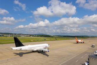 SAS and Easyjet Airlines Passenger Airplane Taxiing and Take Off on Runway in a Sunny Summer Day