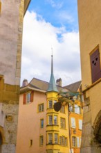Old Town with Corner House with Tower and Sky and Clouds in a Sunny Autumn Day in City of Biel,