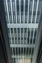 Window View on a Modern Office Building with Windows in a Sunny Day in Zurich, Zurich Canton,