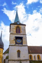 Old Town with House and Clock Tower with Sky and Clouds in a Sunny Autumn Day in City of Biel,