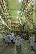 People in protective clothing visit the Chernobyl nuclear power plant, Chernobyl nuclear power