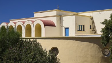 Primary school, Building with arches and Mediterranean flair under a blue sky, Historicism, Art