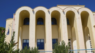 Primary school, Front view of a Mediterranean building with large arches, Historicism, Art Deco,