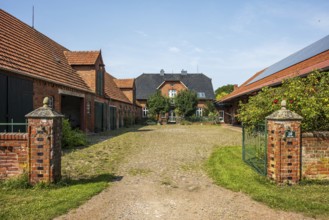 A farm with a spacious courtyard flanked by brick buildings in sunny weather, Oiste, Blender, Lower