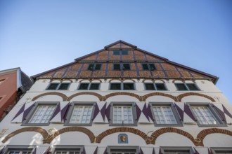 Half-timbered house with striking gables and windows, against a blue sky, Warendorf, Münsterland,