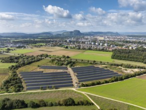 Aerial view, solar modules, solar park, photovoltaics, power generation from solar energy, behind