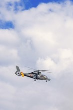 French marine helicopter flying on the sky, Crozon peninsula, Bretagne, France