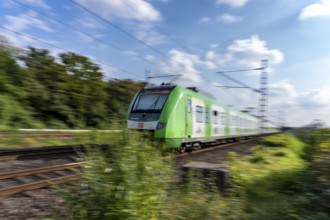 Train traffic on one of the busiest railway lines in Germany, regional traffic, S-Bahn S1, train