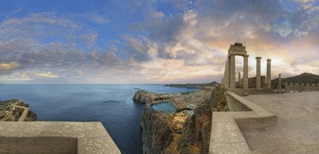 Breathtaking view from the Acropolis of Lindos with columns of the Temple of Athena at sunset and