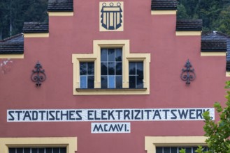 Façade with lettering, historic building, municipal power station, Mühletorplatz, Feldkirch,