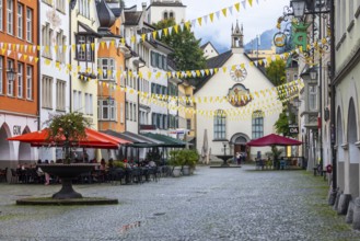 Market square, historic buildings, fountain, St John's Church, Feldkirch, Vorarlberg, Austria