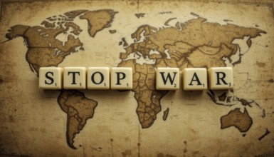 The words 'STOP WAR' are spelled out with letter tiles on a detailed, antique-style world map,