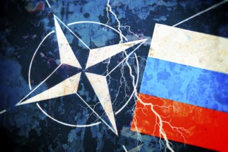 The flags of NATO and Russia with lightning, conflict between Russia and NATO, photomontage