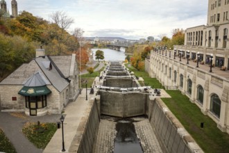 Scenic view of the Rideau Canal locks, leading to the Ottawa River surrounded by autumn trees and