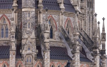 The Canadian Parliament buildings with detailed stonework and spires in Ottawa, Ontario, Canada,