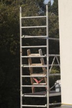 Borken, NRW, Germany, Scaffolding structure with ladder supporting outdoor construction and