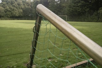 Borken, NRW, Germany, Soccer goal with green net on a grass sports field