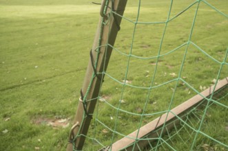 Borken, NRW, Germany, Soccer goal net showing a green field for playing football