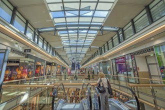 Shops, skylight and escalator in Forum Allgäu, Kempten, Allgäu, Swabia, Germany