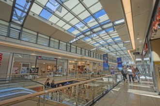 Shops, escalator and skylight in Forum Allgäu, Kempten, Allgäu, Swabia, Germany