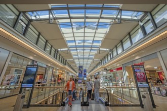 Shops, escalator and skylight in Forum Allgäu, Kempten, Allgäu, Swabia, Germany