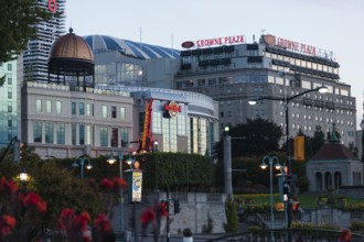 Crowne Plaza and surrounding buildings with evening lights and urban surroundings in Niagara Falls,