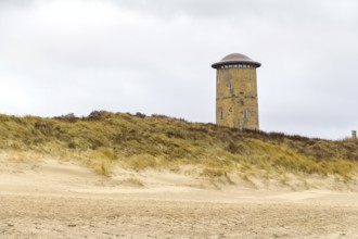 Coastal beach scenery at the North Sea including the water tower near Domburg in Walcheren in the