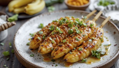 A close-up shot showcases delicious grilled banana skewers, drizzled with a glossy glaze and
