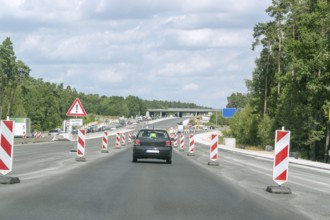 Scenery on a german motorway with road construction zone in sunny summer ambiance