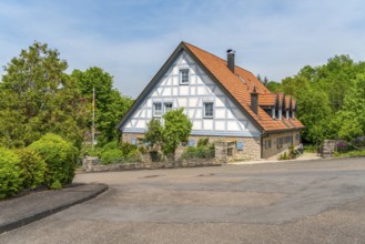 Historic rural half-timbered house seen in Jagsthausen, a small town in Southern Germany