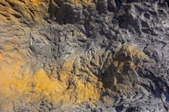 Full frame abstract bicolor rough stone surface