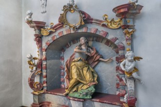 Church of St Gallus and Ulrich, niche with female figure of a saint and putti, Kisslegg, Allgäu,