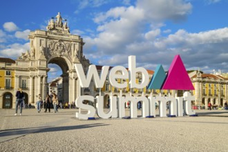 Nov 13, 2024 - Lisbon, Portugal: Big sign Web Summit near iconic Arco da Rua Augusta, beautiful