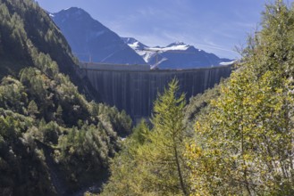 Waterfall bottom reservoir, dam wall, construction site, mountain panorama, energy industry, hiking