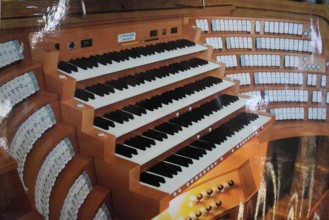 Close-up of a large organ console with numerous stops and manuals, St Lorenz Church, Nuremberg,