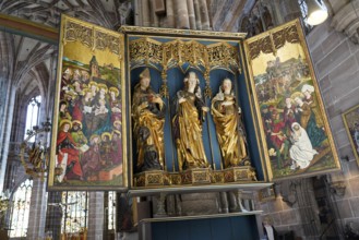 Magnificent altar with detailed figures and gilded decorations, Church of St Lawrence, Nuremberg,