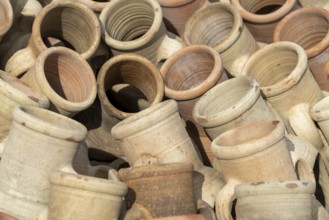 Full frame shot showing lots of sunny illuminated amphoras