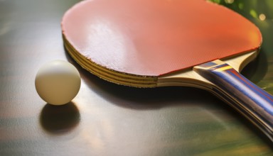 AI generated table tennis closeup scenery including a ball and rack on the table
