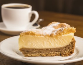 Piece of cake on a plate in coffee-table ambiance, AI generated image
