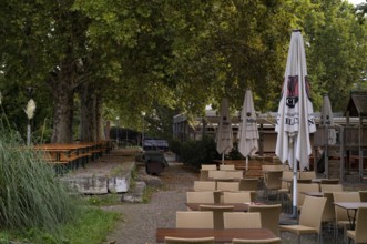Beer garden on the Neckar, Neckar beer garden, empty, closed, Dinkelacker logo, Bad Cannstatt,