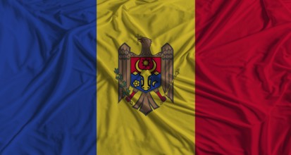 Moldovan flag with fabric texture background. National flag of Moldova
