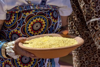 Food on a clay plate to be offered to Exu, an entity of the Afro-Brazilian religions Umbanda and