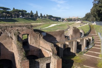 View over ruins of grandstands around curve of Roman Circus Maximus from antiquity, Rome, Lazio,