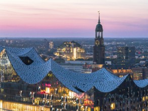 Aerial view of the Elbphilarmonie with St Michael's Church and Hamburg Bunker in the background at