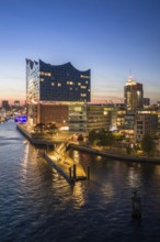 Aerial view of the Elbphilharmonie with ferry pier during the blue hour, Hamburg, Germany