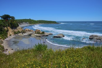 Coastal landscape with waves, rocks and blue sky, Cape Foulwind, West Coast, South Island, New