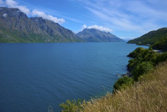Sweeping views over a tranquil lake nestled in majestic mountains, Devil's Staircase Lookout Point,