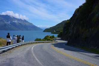 Travellers enjoy the view of the lake and mountains, Devil's Staircase Lookout Point, Kingston,